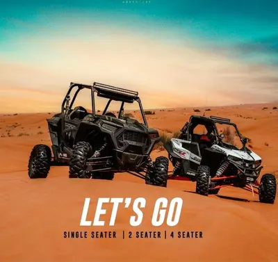 two atvs in the sand in the desert at NightStars Luxury Camp in Merzouga
