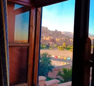 a view of a desert from a window at La Fibule D'or in Aït Ben Haddou
