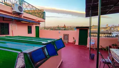 a balcony with a view of a building at Riad Basma Fes - Brand New Bathrooms & AC in Fès