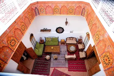 an overhead view of a room with a table and chairs at Riad Safir in Meknès