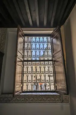 a glass window in a room with a ceiling at Dar Chez Khadija in Fès