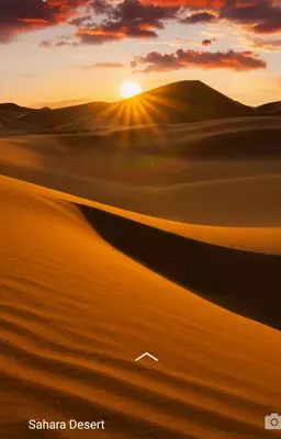 a desert sunset in the sahara desert at Hotel Riad Le Petit Prince in Merzouga