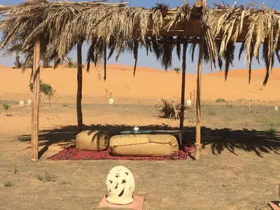 a hut in the middle of the desert at Merzouga Camel's & Camp in Merzouga