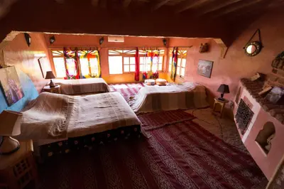 an aerial view of a bedroom with two beds at Kasbah Itran in Kalaat MGouna