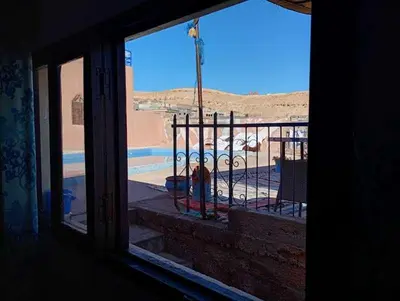 a view of a beach from a window of a building at Grotte Salwa in Aït Ben Haddou