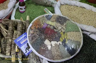 a basket filled with different types of food on a table at Luxury Desert Camp in Merzouga in Tisserdmine