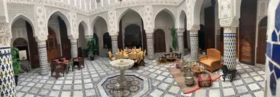 an overhead view of a room with tables and chairs at Riad Palais Marouane in Meknès