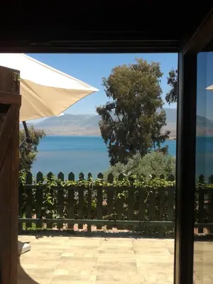 a view of the ocean from a house window at Soo Bin in Bine el Ouidane