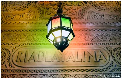 a lamp hanging from the ceiling of a building at Riad Layalina Fes in Fès