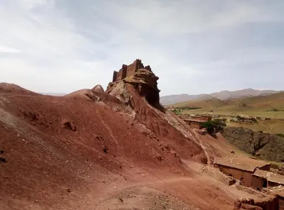 a rock formation on the side of a mountain at Afoulki Ecotourism Guest House in Telouet