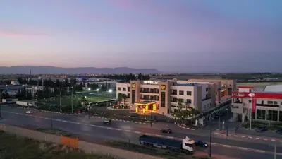 a view of a city with a street and buildings at Z Hotel Meknes in Meknès