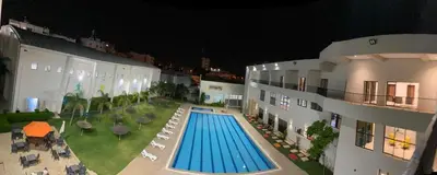 an aerial view of a swimming pool in a building at Eventi Club by cité des sports adarissa in Fès