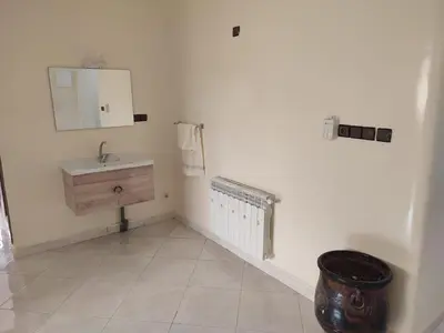 a bathroom with a sink and a mirror at STOPOVER 1 MIDELT in Midelt