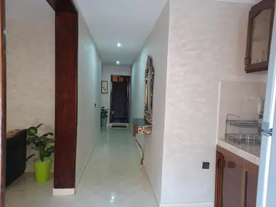 a hallway of a house with a stairway at The Orchard Comfy & Cozy Apartment 2 in Ifrane