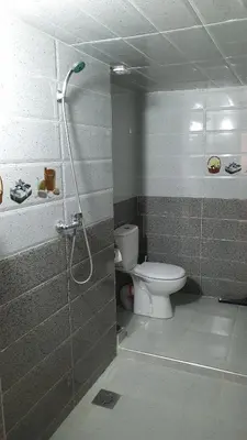 a bathroom with a shower and a toilet at Maison GHITA in Azrou