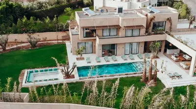 an aerial view of a house with a swimming pool at Palais Nohe in Marrakech