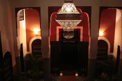 a chandelier hanging from the ceiling in a room at Riad Tafilalet in Fès