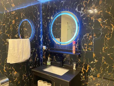 a bathroom with a sink and a mirror at Bloemen Huis in Fès