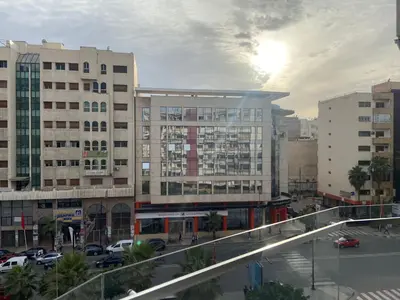 a view of a city with buildings and a street at Bloemen Huis in Fès