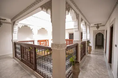 a corridor of a building with a balcony at Riad Dari Fes in Fès