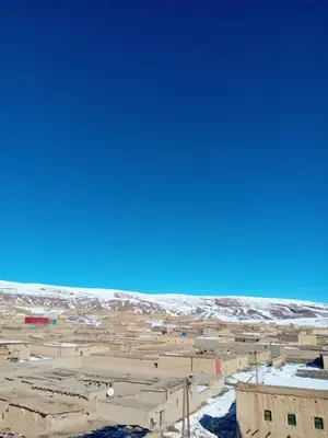 a view of a desert with snow on the ground at Auberge Chez Bassou Agoudal in Agoudal