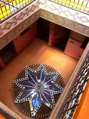an overhead view of a star on the floor of a building at Hotel Restaurant Hollywood Africa in Aït Ben Haddou