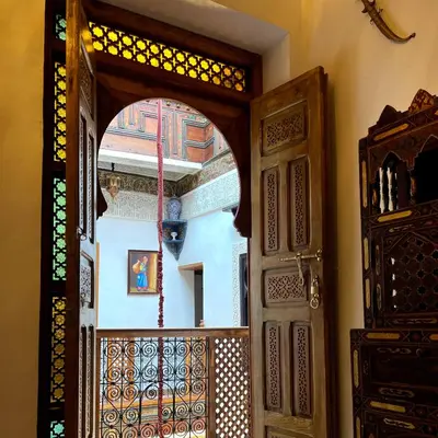 an open door in a building with a window at Riad dar Kirami in Fès