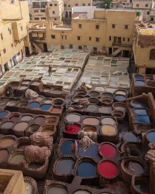 an aerial view of a building with a lot of paints at Riad dar Kirami in Fès