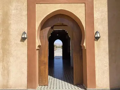 an entrance to a building with an archway at IGHIZ INN resort in Er Rachidia