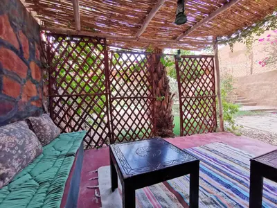 a gazebo with a couch and a table at Riad Dar Zaouia in Zagora