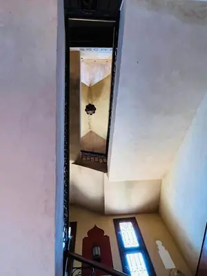 an overhead view of a staircase in a building at Kasbah Tialouite in Kalaat MGouna