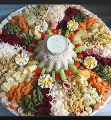 a large platter of vegetables on a plate at Kasbah Tialouite in Kalaat MGouna