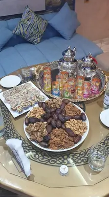 a table topped with two plates of food on a table at Relais Des Nomades in Tinerhir