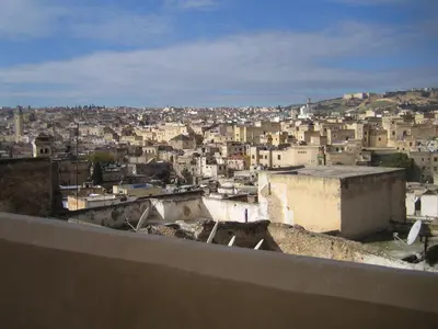 a view of a city from the roof of a building at DAR SEFFAH au cœur de la Médina in Fès