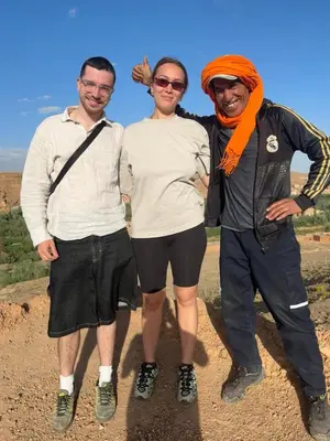 a group of three people standing on top of a mountain at Authentique Berbère in Agoulzi