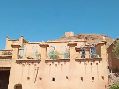 a model of a house with a balcony at Authentique Berbère in Agoulzi
