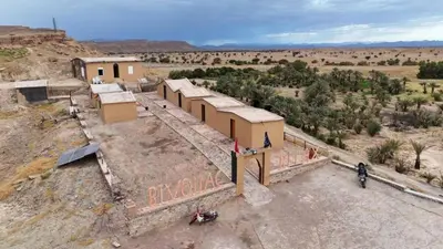 an aerial view of a building in the desert at Auberge camping café restaurant Relax Tazoulait in Bou Dib