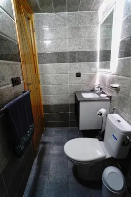 a bathroom with a toilet and a sink at Appartement Emeraude - Calme, Moderne & Sécurisé in Fès