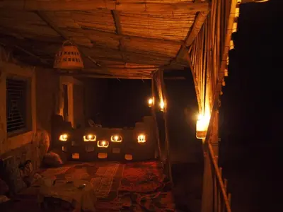 a room with a bunch of candles in a room at Dar Nomad Tagounite in Zagora