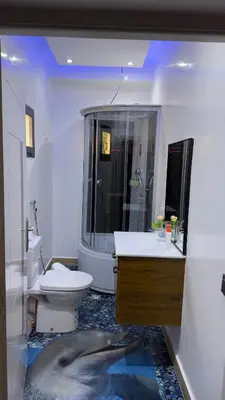 a bathroom with a sink and a toilet at la vue panoramique in Marrakech