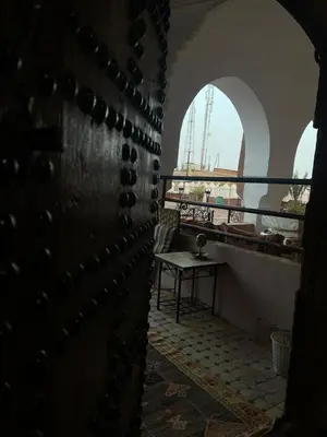 a room with a bunch of wine bottles at Kasbah Tifoultoute in Ouarzazate