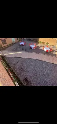 a group of tables sitting on the side of a road at Ryad lcaid in Tissint