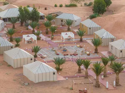 an aerial view of a camp in the desert at sahara oasis camp in Merzouga