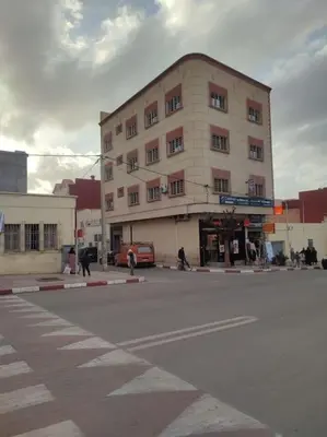 a large building on a street in a city at Thé good stay4 midelt in Midelt