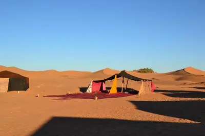 a tent in the middle of the desert at Camp Mbark authentic in Mhamid