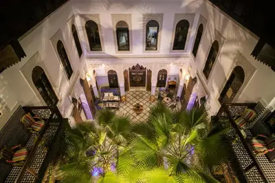 an overhead view of a building with palm trees at Riad Semlalia in Fès