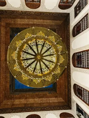 a chandelier in the ceiling of a building at Riad Damia Suite & Spa in Fès