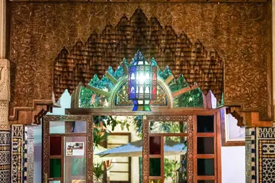 a door with a lamp on top of it at Riad Arabesque & Spa in Fès