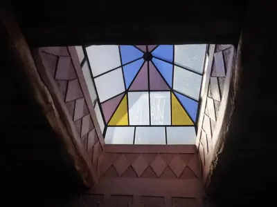 a view of a stained glass window in a building at Gîte Assafar in Kalaat MGouna