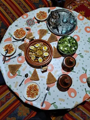 a table with a bunch of food on it at DAR JOUD in Tabourahte